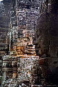 Angkor Thom - Bayon temple, second enclosure, corner towers seen from the central terrace 